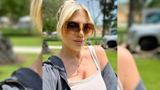 After being blindsided by Dean, Tori Spelling displays her PDA with a new man.