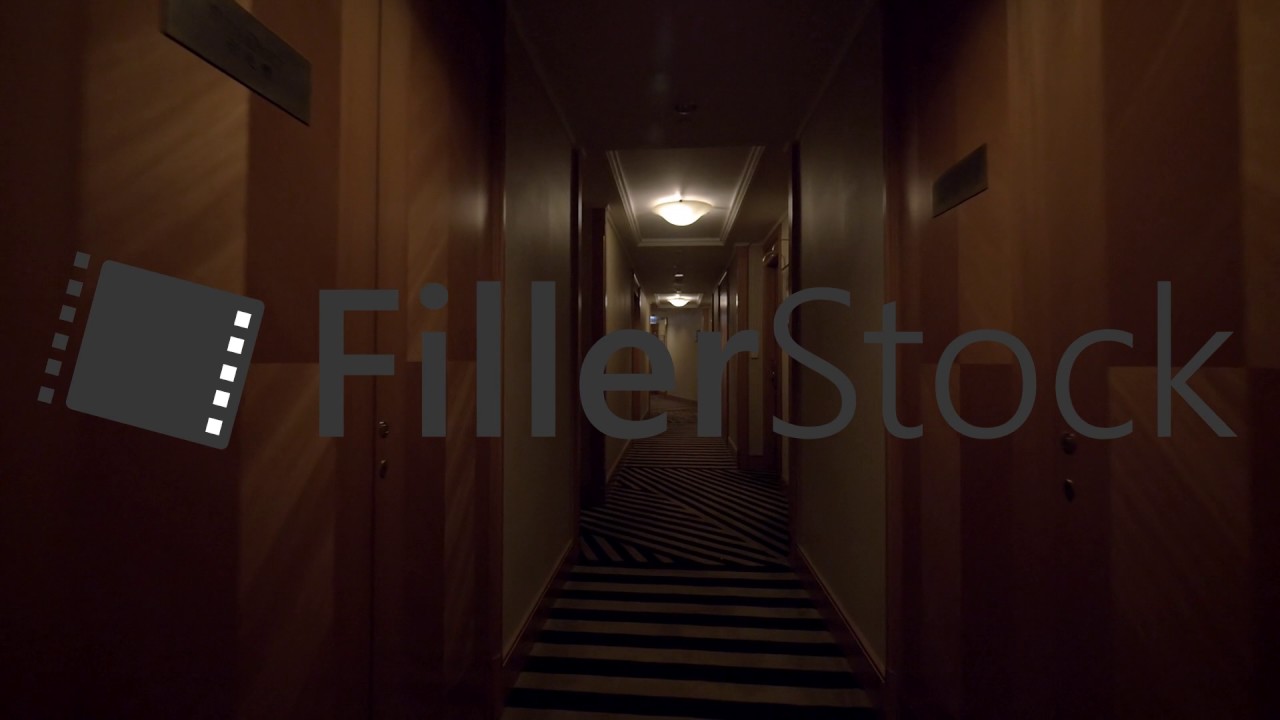 Walking through the hotel corridor