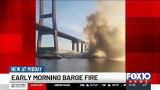 Heavy smoke seen coming from barge fire in Mobile River