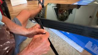 Attaching the legs to a Vizio 50 Inch 4k TV