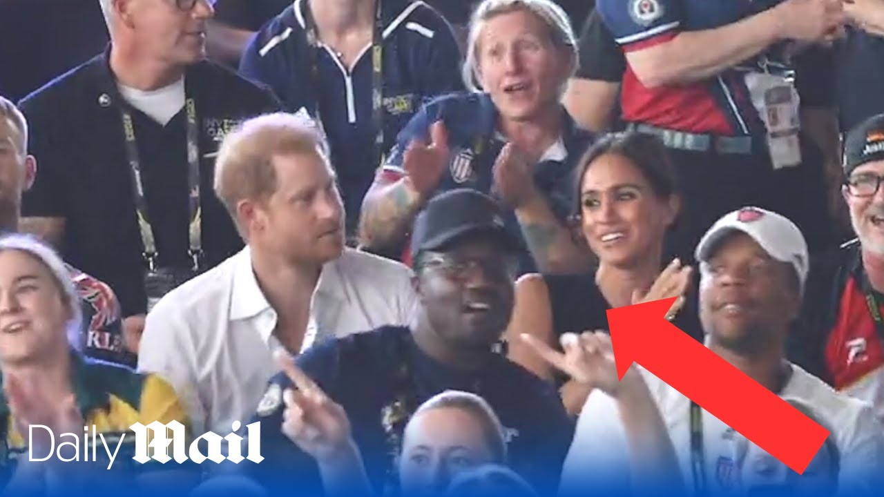 Meghan Markle sings along to Sweet Caroline – while Harry claps out of time at the Invictus Games