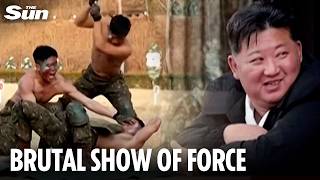 Kim Jongun Grins As His Fanatical Troops Break Bricks Over Their Heads And Are Smacked With Shovels