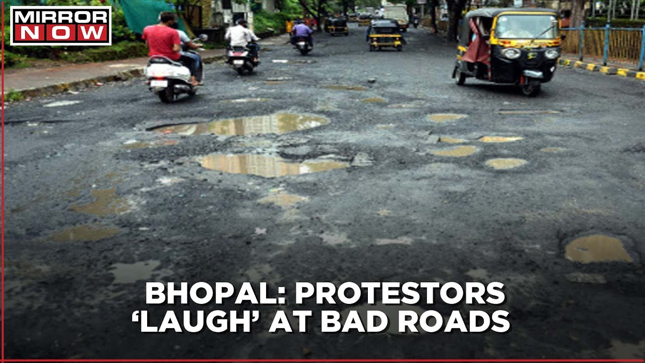 Unique protest in Bhopal: Protestors ‘laugh’ at bad roads