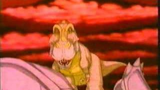 A Tyrannosaurus and its young are being attacked by a lone Tricerat...