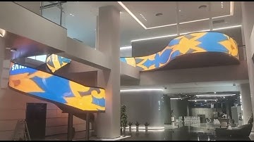 JR Visual Customized StarLink transparent LED display installed on the sloping escalator