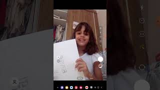 Vídeo de ju paçoquinha mostrando os desenhos dela.