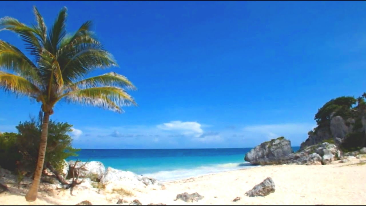 Suono rilassante delle onde del mare in una bellissima spiaggia ...