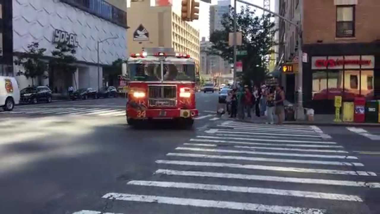 FDNY TOWER LADDER 21 & FDNY ENGINE 34 RESPONDING ON 10TH AVE. IN HELL'S