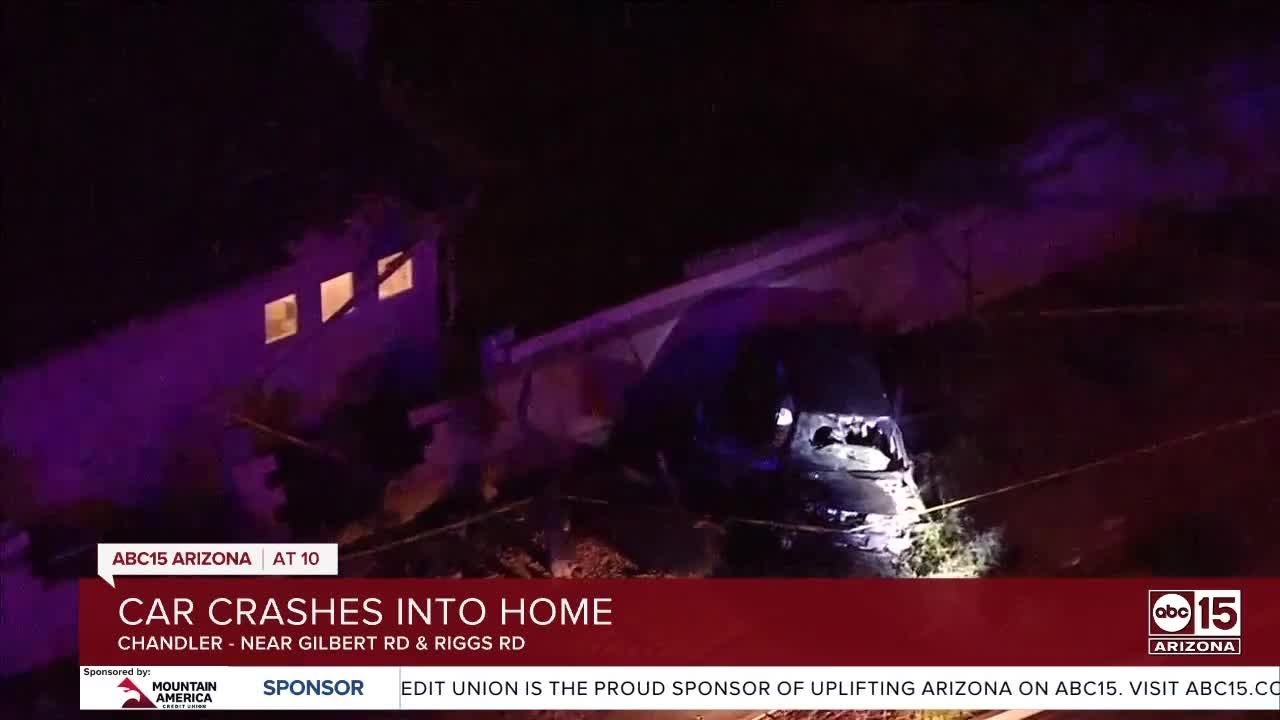 Driver taken to hospital after crashing into Chandler home - YouTube