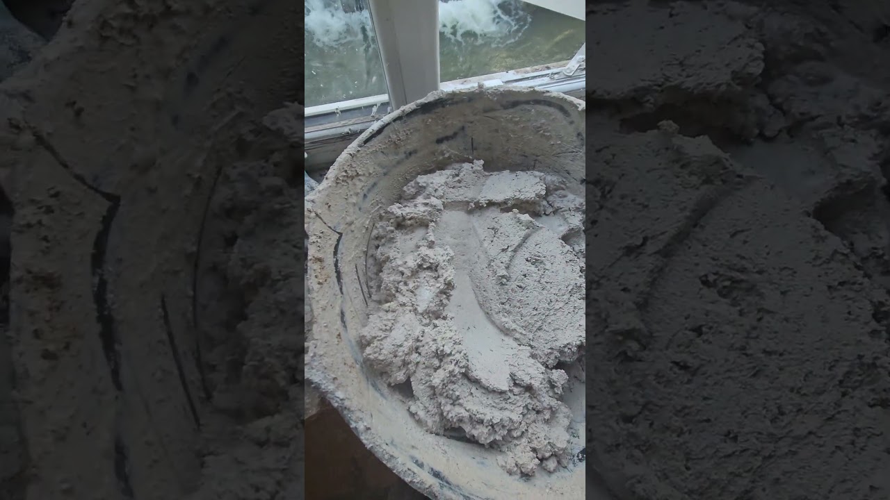 Mixing lime plaster. 