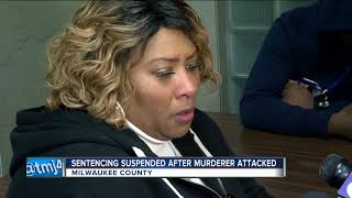 Chaos in the courtroom: Victim attacks brother's killer in court