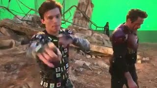 Robert Downey Jr give tom holland a big kiss behind the scenes of endgame.