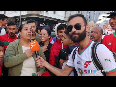 مشجعة مغربية تفتخر بالمنتخب المغربي 