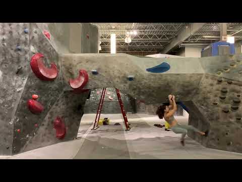 Woman Athlete Shows Amazing Jump Move While Doing Wall Climbing - 1092019