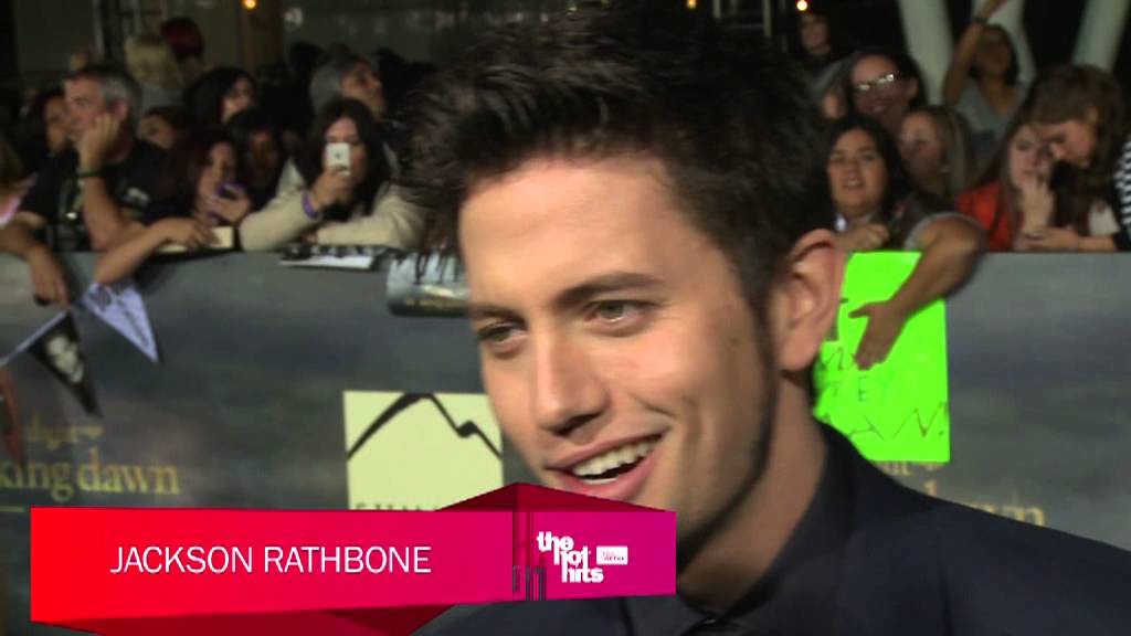 celebrity family feud Twilight Breaking Dawn Part 2 Premiere - Taylor Lautner Kisses A Dog