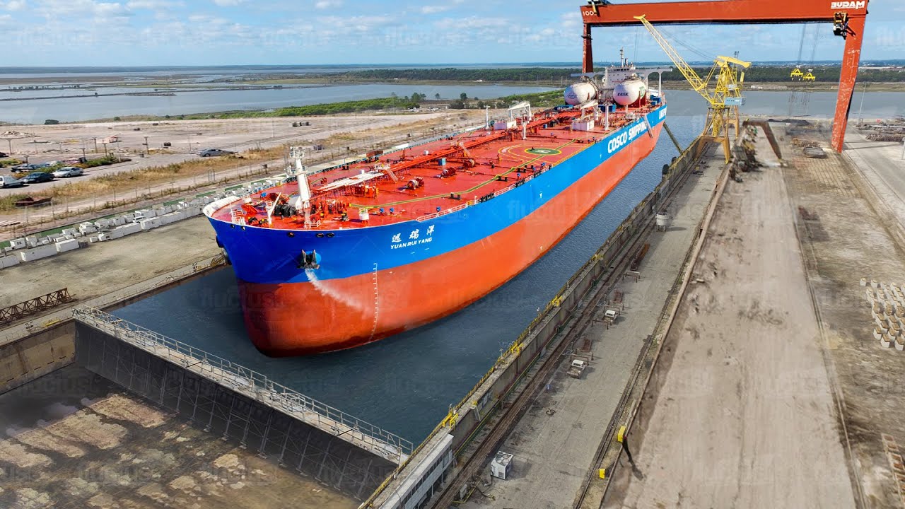 The Impressive Process of Moving Gigantic Ships into Dry Docks