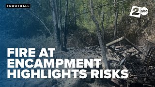 Emergency crews pull back from extinguishing homeless camp fire on state lands