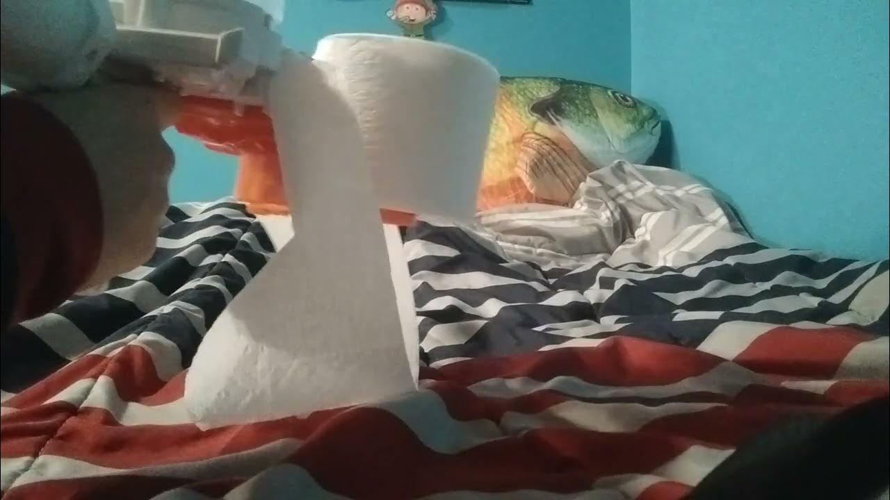 Shooting the toilet paper gun 🔫 YouTube