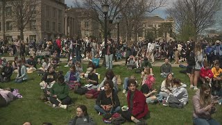 Around 3,000 people gathered at University of Iowa to watch ...
