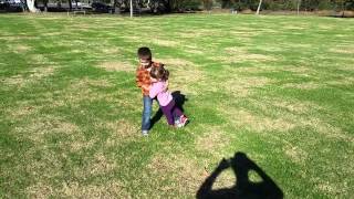 Archer teaching Lily how to dance