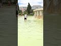 monks and youth play in the fountain in Belém as part of the WYD 2023