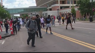 Protesters call for charges in death of Michael Brown