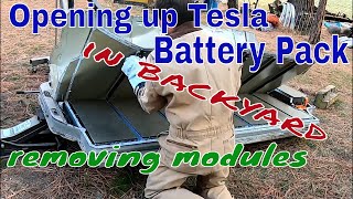 Taking Tesla Model S 85 battery pack apart in the backyard with basic tools. 85kWh battery pack