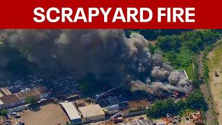 Large scrapyard fire erupts in Darby Township