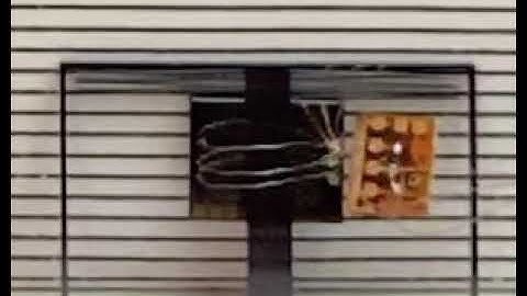 A Jumping Silicon Microrobot With an Energy Storing Substrate Spring - 1/8th Real Time