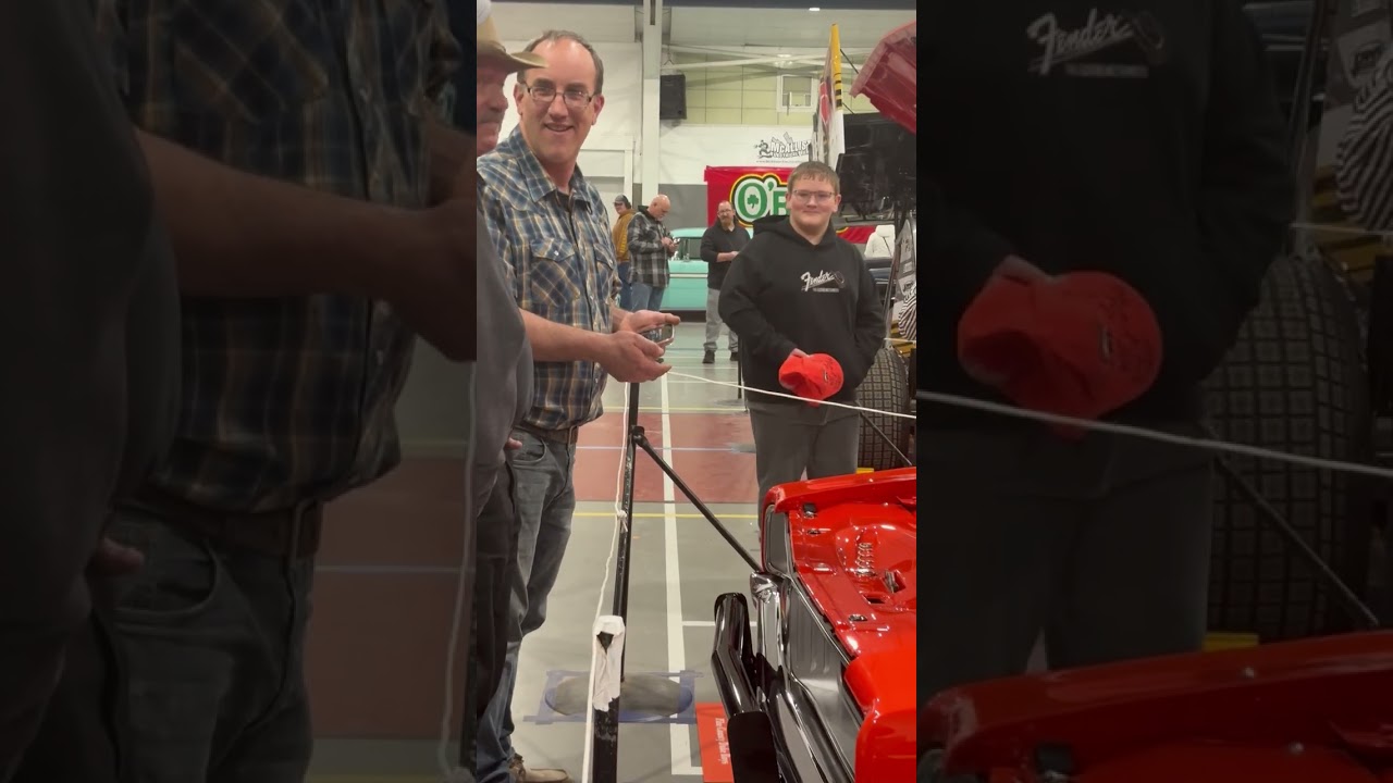 Tom Wopat and General Lee builder Chad Rennecker. Honks horn and starts car with his phone.