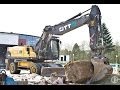 Volvo EW 230 C Mobilbagger mit Oil Quick bei Abbrucharbeiten (HD