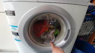 How to stop an Electrolux washing machine in the middle of the cycle and open the door