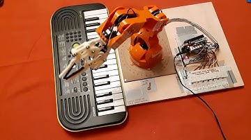 Arduino & Braccio Robot arm playing a couple of Xmas tunes