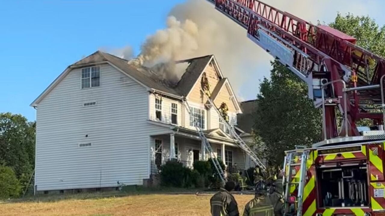 Officials: 2-alarm fire causes major damage to Concord home - YouTube