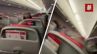 Passengers scream in terror as sandstorm strikes plane, while sky turns red in Australia