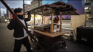 Yataii, Fukuoka, Japan A popular street food stall vendor  serving yakitori and ramen