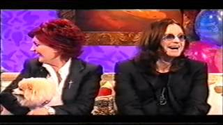 Ozzy Osbourne surprises Paul O'Grady with a birthday cake