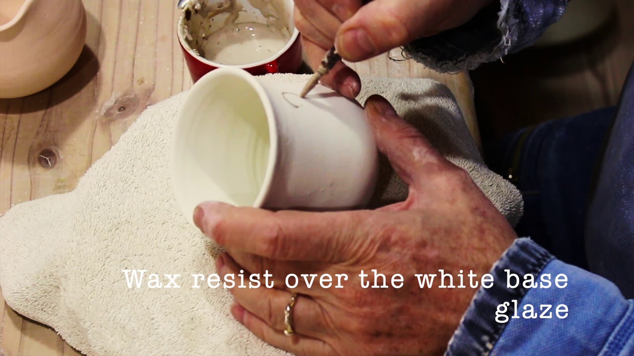 How I apply wax resist decoration to pots. 