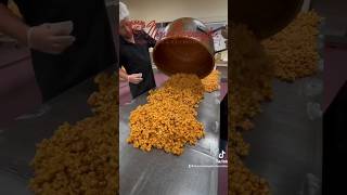 Mixing up a fresh batch of Caramel Corn. 😋 #factory #caramel #popcorn #caramelpopcorn #treat #yum