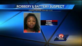 2 women sought in armed robbery, running over man's leg
