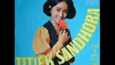 TITIEK SANDHORA - MERANTAU [Official Music Video]