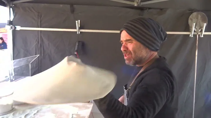 The faster way to stretching a Pizza ( But not the easy way )