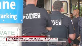 Shot in I-70 robbery chase, Columbus officer is now walking out of hospital