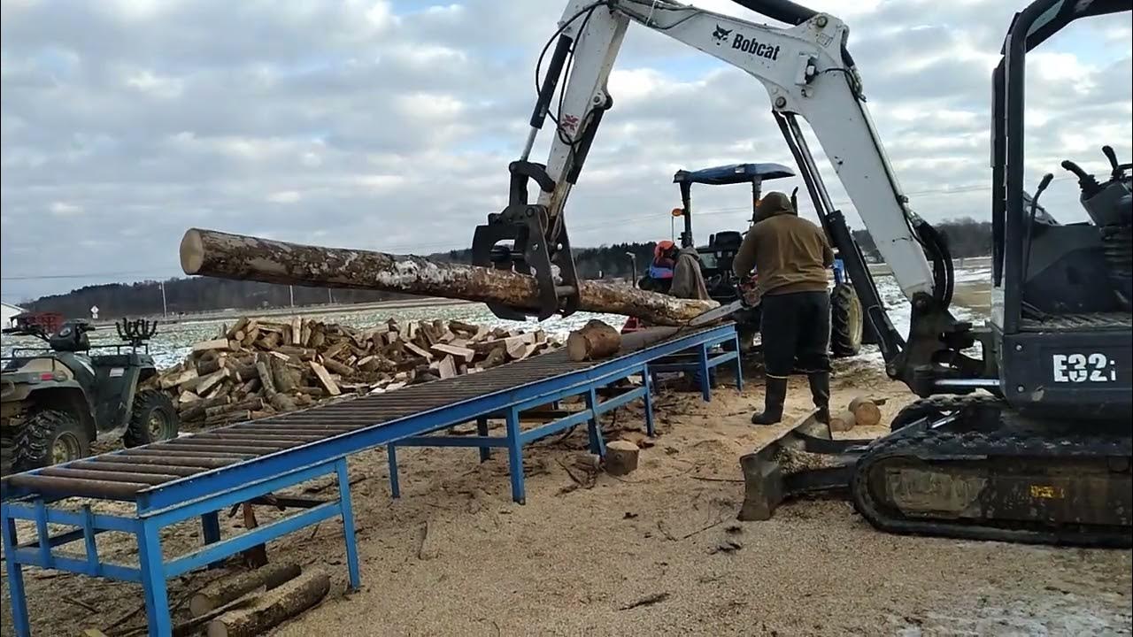 Cutting and splitting firewood efficiently with excavator grapple YouTube