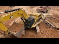 Caterpillar 365C Excavator Loading Man And Mercedes Trucks