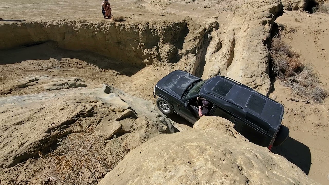 Stock '99 discovery 2 on 32s - pieces of bumper left behind