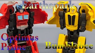Chuck's Reviews Transformers Earthspark Taticons Optimus Prime and Bumblebee