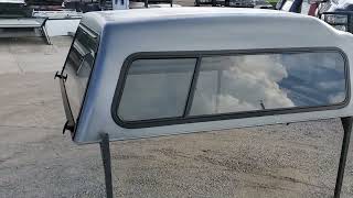 Walkaround of used cab High fiberglass camper shell fits 02-08 & 09-18 Dodge Ram full size 6.4' bed
