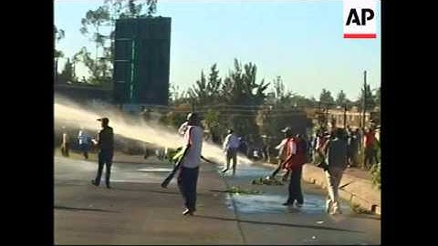 Police and protesters clash at pro-opposition rally, water cannon