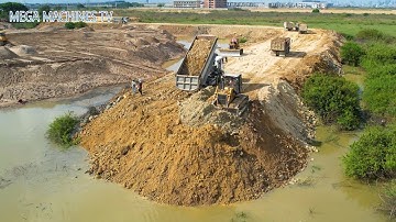 PERFECT TWO BULLDOZER KOMATSU D53P MOVING SOIL GRAVEL AND STONES TO​​​​ IN WATER ! TRUCK UNLOADING